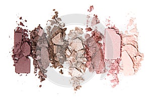 A smashed, neutral toned eyeshadow make up palette isolated on a white background