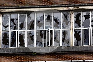 Smashed Windows in the Derelict Unigate Factory, Great Torrington, Devon, England.