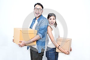 SME or freelance asian woman and man working with box