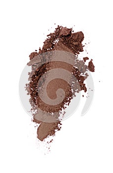 Smear of crushed brown eyeshadow as sample of cosmetic product