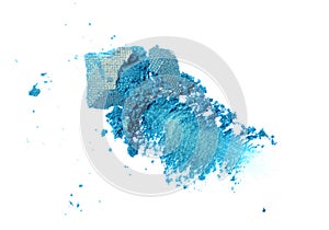 Smear of crushed green eyeshadow as sample of cosmetic product