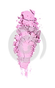 Smear of crushed pink eyeshadow as sample of cosmetic product