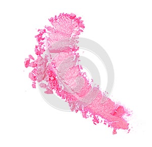 Smear of crushed shiny pink eyeshadow as sample of cosmetic product isolated