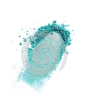 Smear of crushed teal eyeshadow as sample of cosmetic product