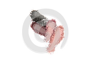 Smears of different decorative cosmetics on a white background isolated