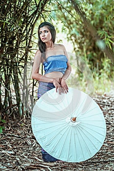 Smile ancient Thai Woman In Traditional Costume Of Thailand