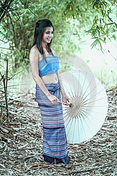 Smile ancient Thai Woman In Traditional Costume Of Thailand