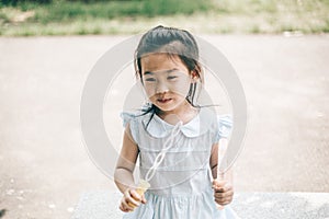 Smile asian baby girl play bubble balloon