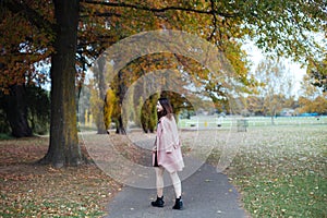 Asian female in autumn nature