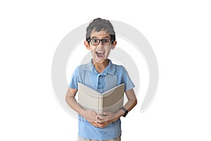 Smile boy in spectacles and t-shirt with book. Isolated over white background. Schoolboy. Teenager.