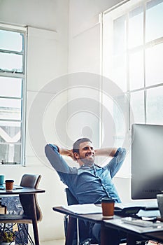 Smile, break and happy man at office desk for stretching, productivity or done with project. Relax, computer and