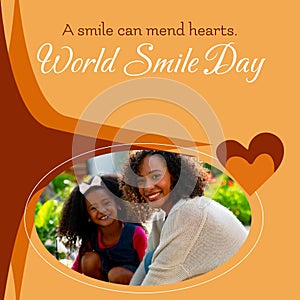 A smile can mend hearts world smile day text and biracial mother and daughter smiling