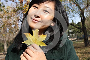 Smile of Chinese young woman of shopping