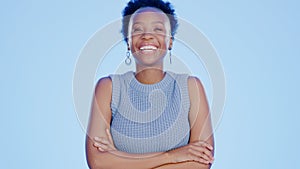 Smile, crossed arms and portrait of black woman in a studio with positive, confident and good attitude. Happy, pride and