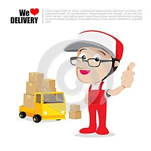 Smile delivery man thumb up on truck , and package delivery cart