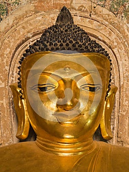 Smile Face of Buddha Image inside Htilominlo Pagoda