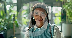 Smile, face and Indian woman in office with green business pride, confidence and dream job satisfaction. Sustainability