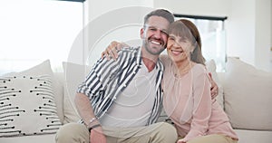Smile, face and man with senior mother on a sofa in the living room at modern family home. Happy, love and portrait of