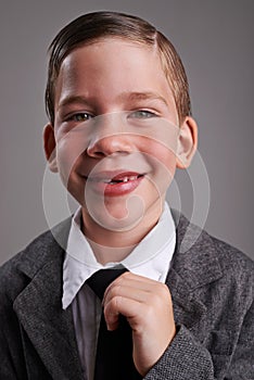 Smile, fashion and portrait of child in studio with classy, fancy and trendy shirt and tie. Happy, cute and young boy