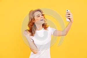 Smile girl blogger. Happy woman take selfie with smartphone. Selfie queen