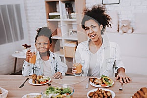 Smile and Happy Girl and Mother. Mulatto Girl.