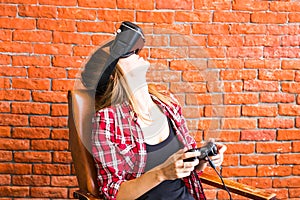 Smile happy woman getting experience using VR-headset glasses of virtual reality much gesticulating hands