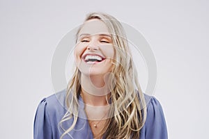 Smile, happy and woman with laughing in studio for funny joke, playful comic and positive humour. Female person