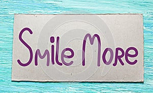 Smile more. Inspirational quote handwritten brush,