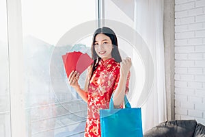 Smile of Portrait Beauty Asian Woman with Chinese dress,Qipao,Cheongsam