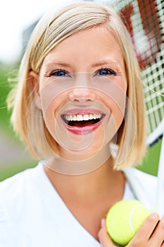 Smile, portrait or happy woman with a ball in tennis training match, fitness exercise or game outdoors. Racket, healthy
