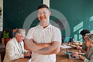 Smile, portrait and a man in a meeting with arms crossed for coworking and business pride. Happy, office and a mature