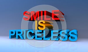 Smile is priceless on blue photo
