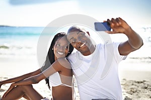 Smile, selfie and black couple at beach on holiday, summer vacation and travel in nature. African man, woman and picture