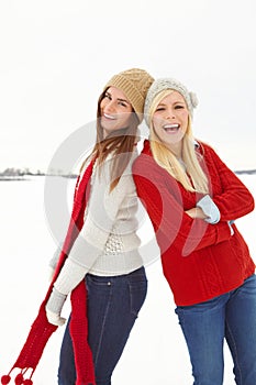 Smile, snow and portrait of girl friends on winter vacation, adventure or holiday for travel in Switzerland. Happy