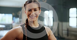 Smile, sports and face of woman in gym with positive, proud and confident attitude for workout. Happy, fitness and