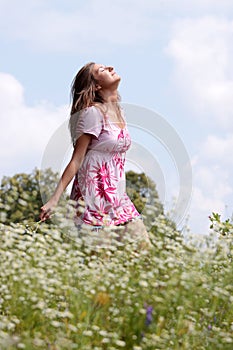 Smile teen open hands standing on field