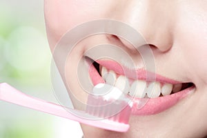 Smile woman brush teeth