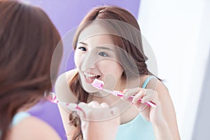 Smile woman brush teeth