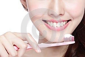 Smile woman brush teeth