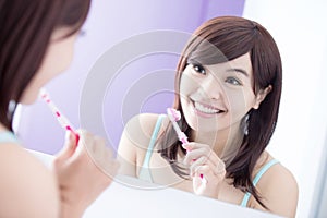 Smile woman brush teeth