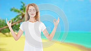 Smile Woman With Closed Eyes In Zen Meditation Pose On Tropical Beach Ocean Sea Background - Summer Yoga Concept, copy space