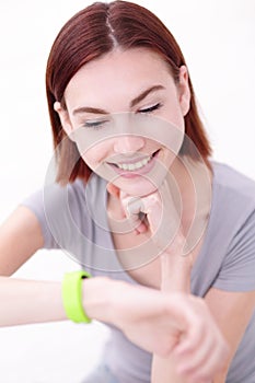 Smile woman look smart watch