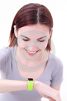 Smile woman look smart watch