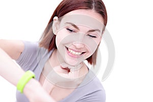 Smile woman look smart watch