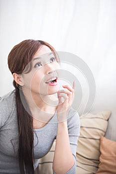 Smile woman sit on sofa