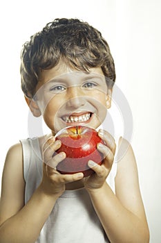 Smiley boy with red apple
