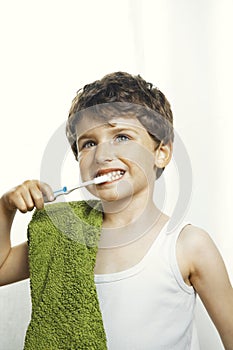 Smiley boy with toothbrush