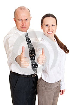 Smiley business people showing thumbs up