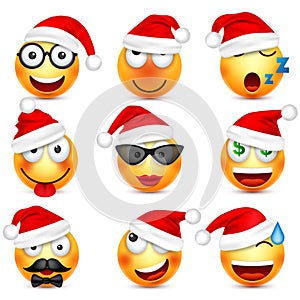 Smiley,emoticon set. Yellow face with emotions and Christmas hat. New Year Santa.Winter emoji. Sad happy angry faces