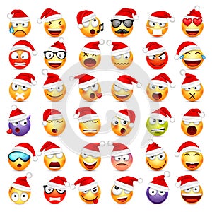 Smiley emoticon set. Yellow face with emotions and Christmas hat. New Year Santa.Winter emoji. Sad,happy,angry faces